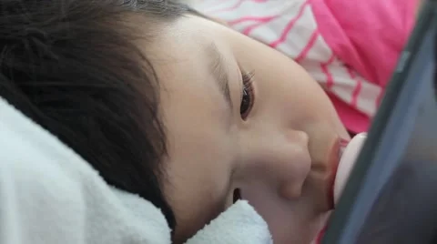 Little boy sleeping on bed and looking telephone, 스톡 동영상 64699344