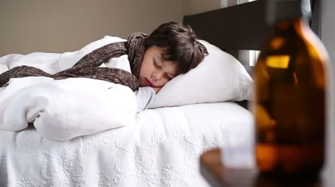 Little boy sleeping, selective focus, ill in bed Stock Footage 46317346