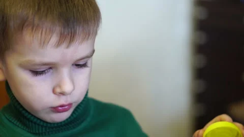 Little boy slow-motion. close-up portrait Stock Footage 85771929