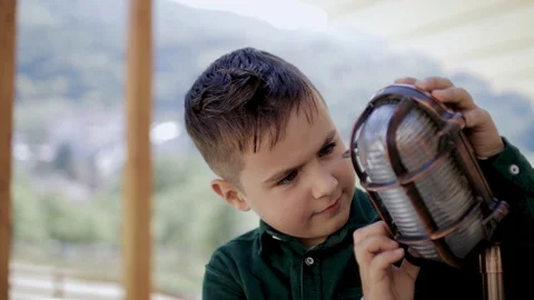Little boy smiles at the camera Video stock 128604225