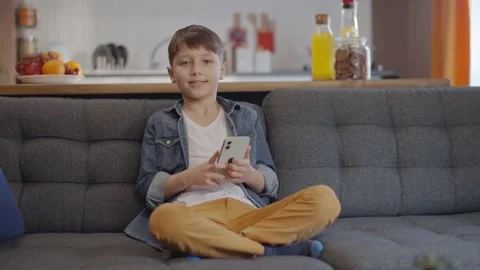 Little boy smiling looking at camera. Stock Footage 148981202