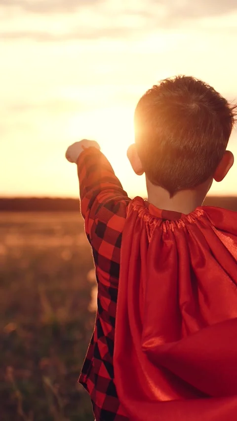 Little boy son running through park sunset superhero costume, child kid dream Stock Footage 277262711