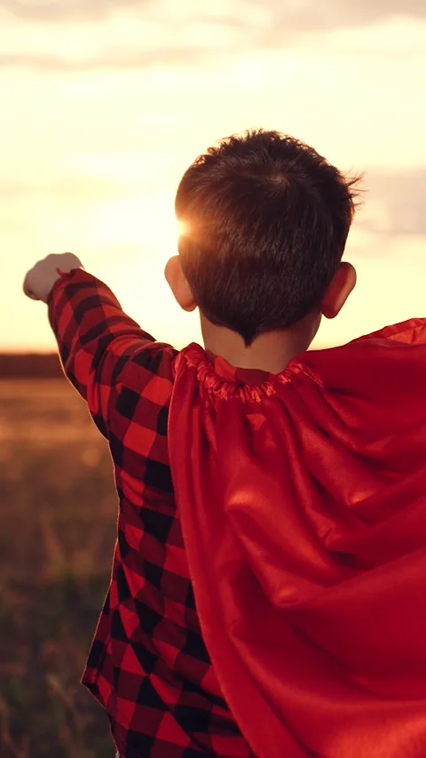 Little boy son running through park sunset superhero costume, child kid dream Stock Footage 279428730