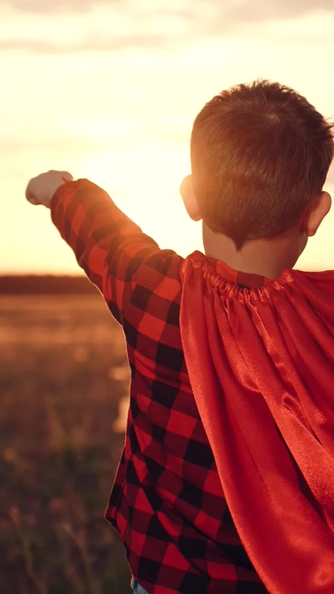 Little boy son running through park sunset superhero costume, child kid dream Stock Footage 282678716