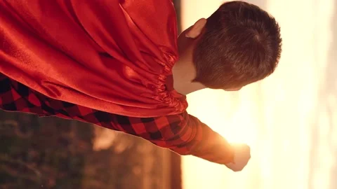 Little boy son running through park sunset superhero costume, child kid dream Stock Footage 302450683