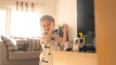 Little Boy Standing in Front of Mirror Stock Footage 263480854