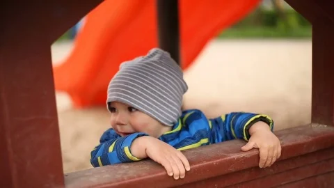 Little boy standing in the open space and looking cute Video stock 75215968