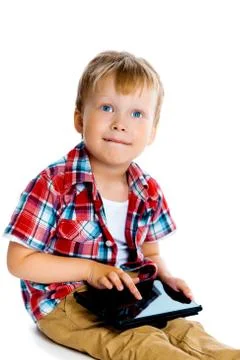 Little boy with a tablet computer Stock Photos