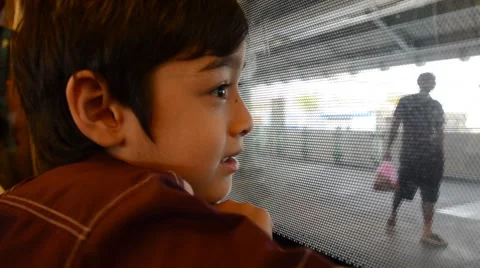 Little boy taking sky train transportation city view Stockbeeldmateriaal 46228232