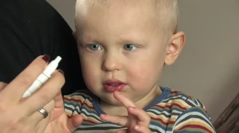 Little boy terrified of medication Stock Footage 11830039