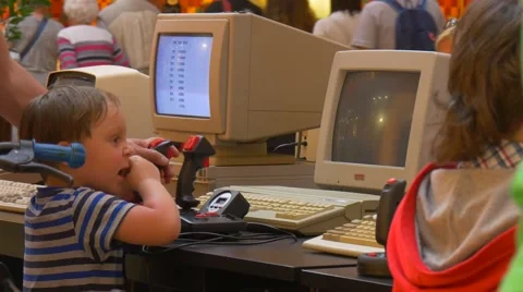The Little Boy Tries to Start a Computer Game Stock Footage 64328158