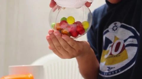 Little boy trying to pull candy Stock Footage 65301675