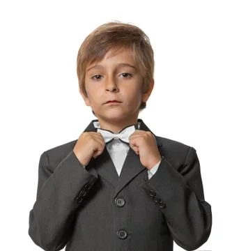 Little boy in a tuxedo, isolate on white background Stock Photos