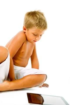 Little boy using digital tablet Stock Photos