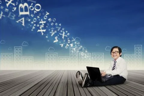 Little boy using laptop to send information 스톡 일러스트