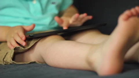 Little boy using a tablet computer, slider move Stock Footage 40498145
