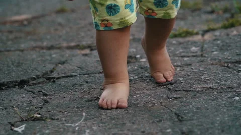Little boy walking and dancing outside Stock Footage 133811725