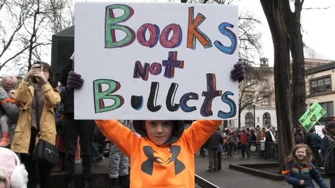 Little Boy Wants Books Not Bullets Stock Footage