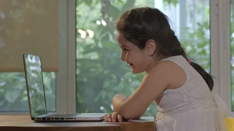 Little boy watching the computer at home. Stock Footage 140582230