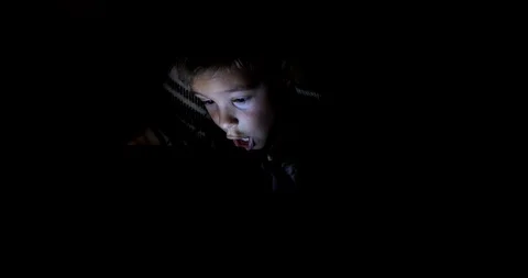 Little boy watching content on her smartphone. Stock Footage 122148219