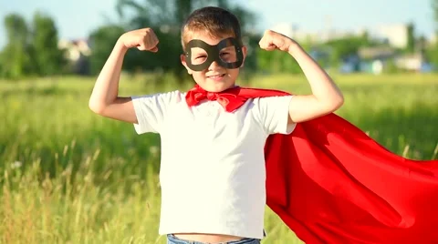 Little Boy wearing Super hero costume showing muscles Stock Footage 59086438