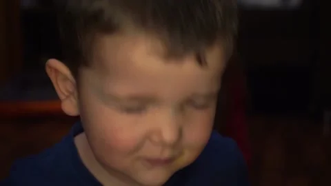 Little Boy wriggles in front of the camera Video stock 168726405