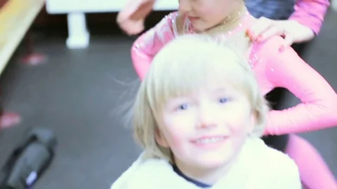 Little brother and sister getting ready | Stock Video | Pond5