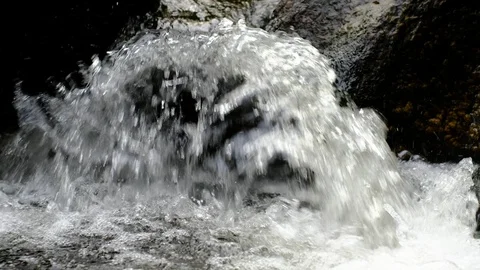Little cascade at the river aist Stock Footage 126766190