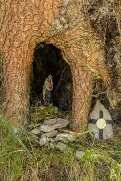 Little chapel under a tree with the virgin mary Stock Photos