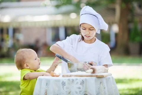 Little chef making dough Stock Photos