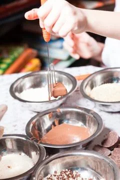 Little chef prepare chocolates Stock Photos