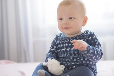 Little child with a bandaged hand Stock Photos