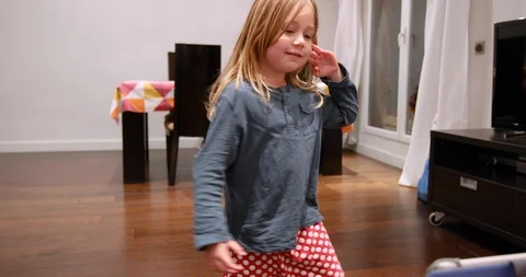 Little child dancing watching tablet Stock Footage 93396493