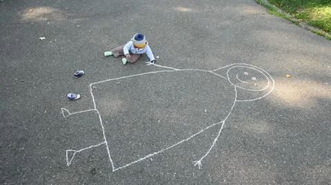 Little child drawing his missing mother on asphalt with a piece of chalk Stock Footage 12303886