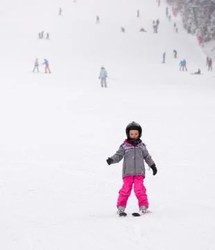 Little child learning to ski Stock Photos