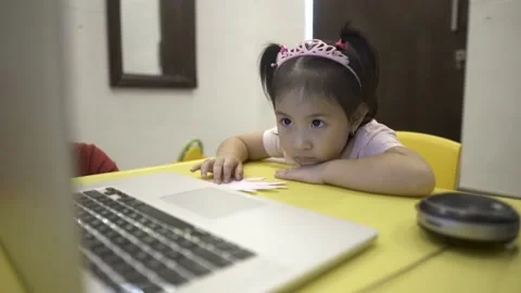 Little child sleepy while having online education from home Stock Footage 158775131