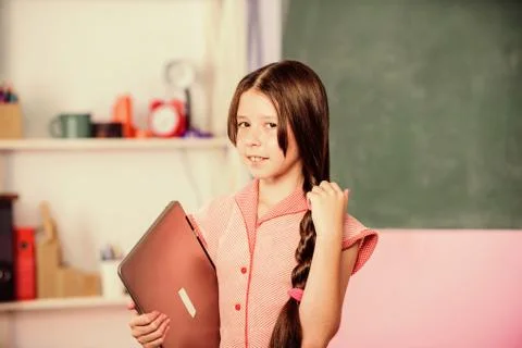 Little child using notebook. Develop own blog. Personal blog. Study programming Foto stock