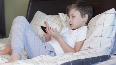 Little child using smart phone for drawing Stock Footage 163845251