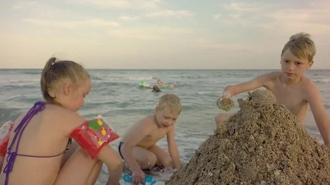 Little Children Playing With Sand Toy On The Beach. Video stock 84264853