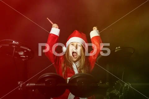 Little crazy drummer Santa Stock Photos