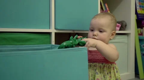 Little cute baby playing in his room Stock Footage