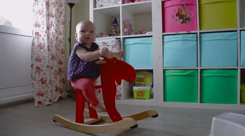 Little cute baby playing in his room Stock Footage