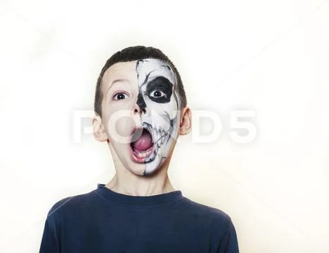 Little cute boy with face paint like skeleton to celebrate halloween, lifestyle Stock Photos