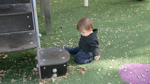 Little cute boy playing on playground. 動画素材 101802364