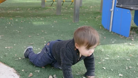 Little cute boy playing on playground. 動画素材 101802838