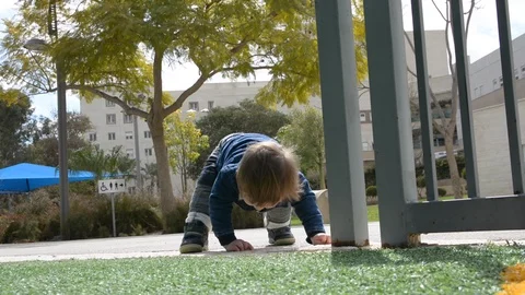 Little cute boy playing on playground. Vídeo Stock 104011810