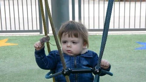 Little cute boy playing on playground. Vídeo Stock 104012293