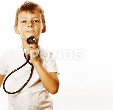 Little cute boy with stethoscope playing like adult profession d Stock Photos