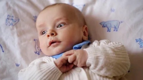 Little cute child lying on the bad Stock Footage 69230345