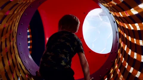 Little excited active boy playing on playground in shopping mall. Happy childhoo 스톡 동영상 156563191